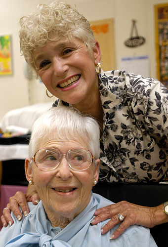 Resident with her daughter in the beauty shop