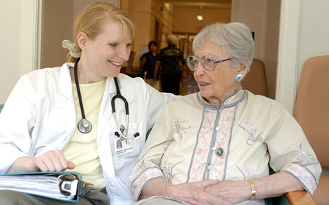 Nurse Practitioner consulting with patient