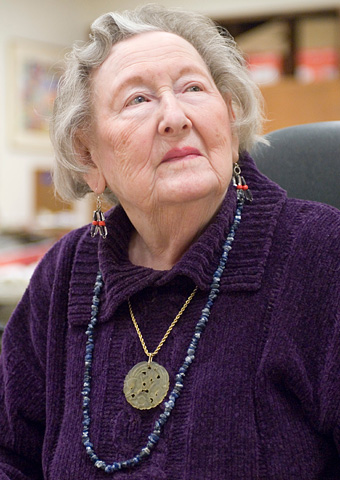 Marian Blechman proudly models a necklace she made